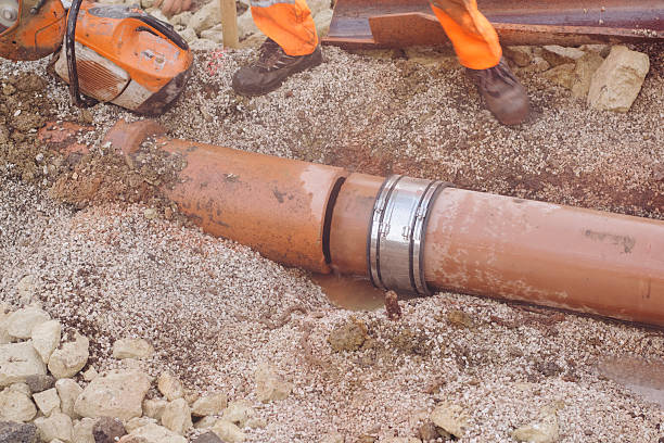 Fast response repair team builders replacing damaged foul sewer drainage pipe Fast response repair team builders replacing damaged foul sewer drainage pipe